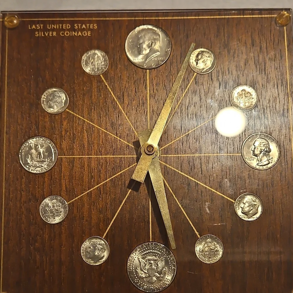 Silver Coin Wall Clock - Brown & Gold. The mechanism works but the hands do not